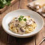 Creamy Mushroom Pasta: The Best Comfort Food You’ll Ever Make 7 creamy mushroom pasta with parmesan and parsley in a white bowl
