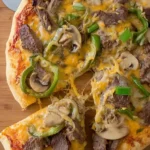 Philly Cheesesteak Pizza: A Delectable Twist on Tradition 7 Mouthwatering Philly Cheesesteak Pizza Slice