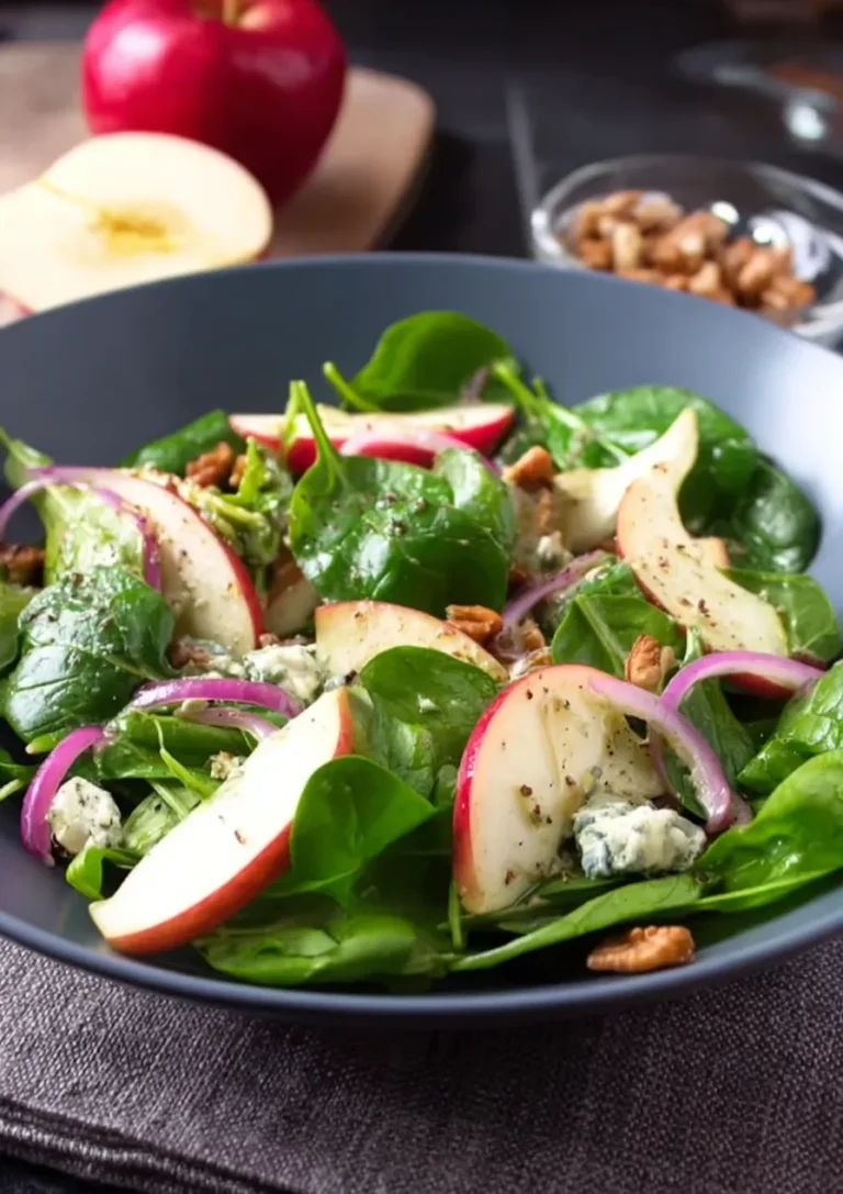 Fresh Spinach and Apple Salad on a Plate